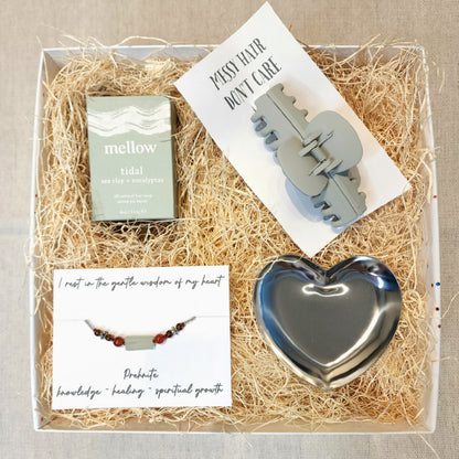 Gift box includes:   - Tidal Sea Salt and Eucalyptus scented soap // Mellow  - Prehnite Semi-Precious Gemstone Bracelet    - Claw Clip  - Heart Trinket Dish 